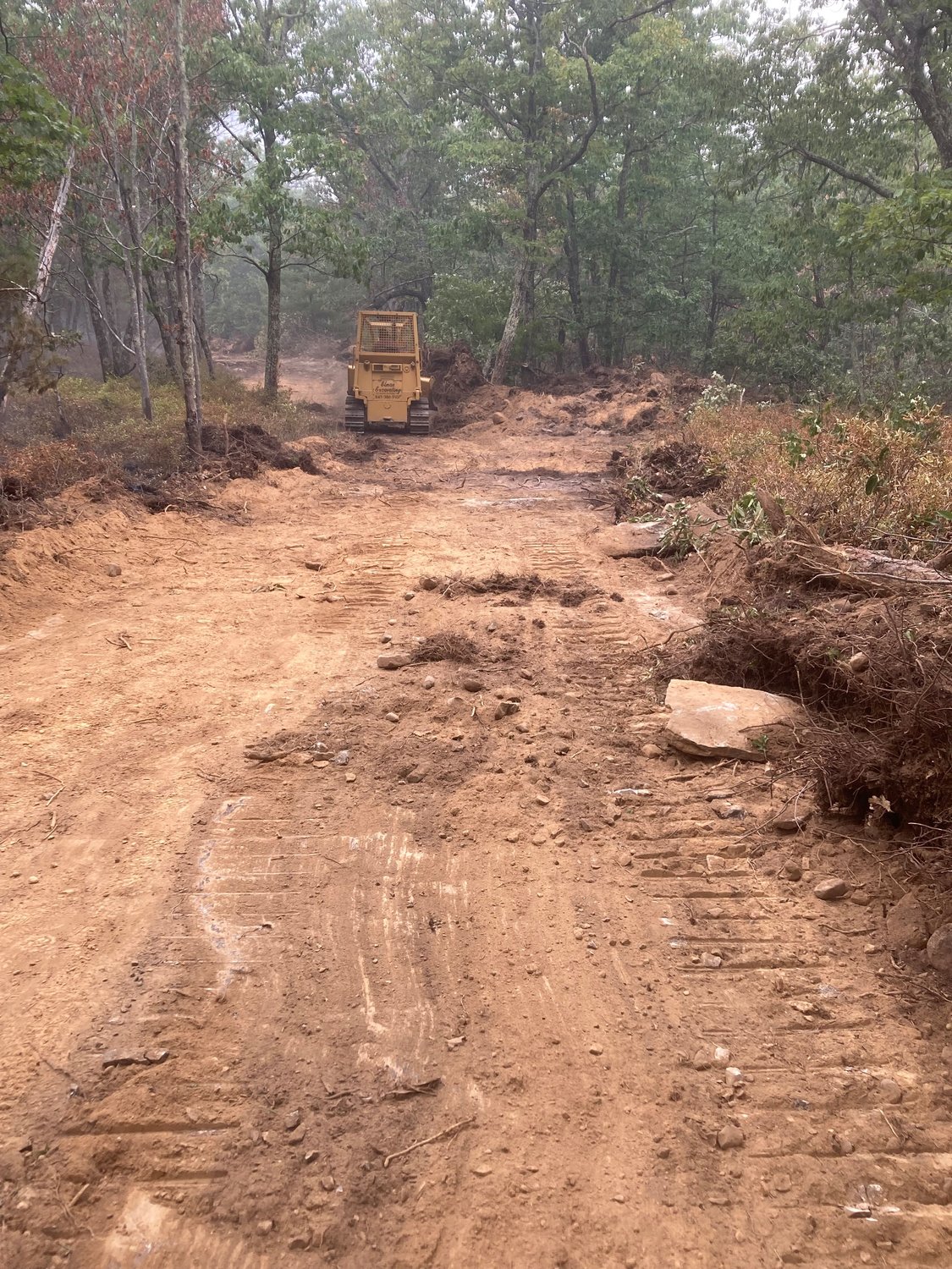 Rangers worked with multiple fire departments to install a fire line with a bulldozer, battling a fire on private lands in the Town of Mamakating the weekend of August 27.